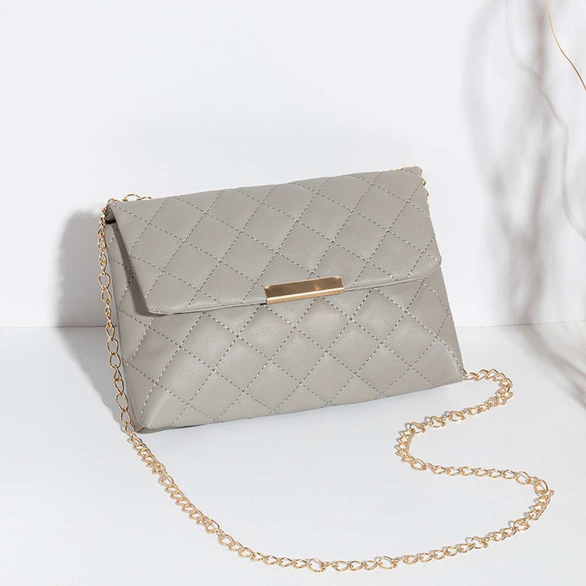 Quilted Chain-Strap Crossbody Bag with Flap Closure