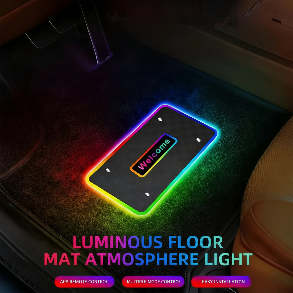 Luminous floor mat atmosphere light with colorful LED display on a dark floor.