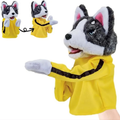 A plush dog puppet hand puppet with a gray and white fur face, pink inner ears, blue eyes, and a bright yellow sleeveless top with a black stripe, shown on a white background. Two smaller inset views at the upper left show the hand puppet closed, and a small portion of a human hand is visible at the lower right holding the puppet.