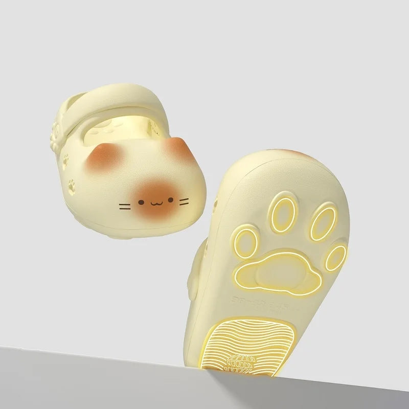 Cute animal-shaped product with a face and paw design on a light gray background