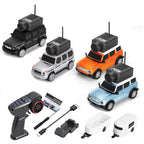 Set of toy cars with remote control and accessories on a white background