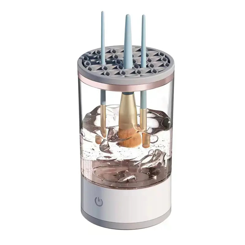 Clear cylindrical device with a white base and gray top on a white background