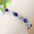 Blue Oval Crystal Fashion Bracelet with Clear Accent Stones