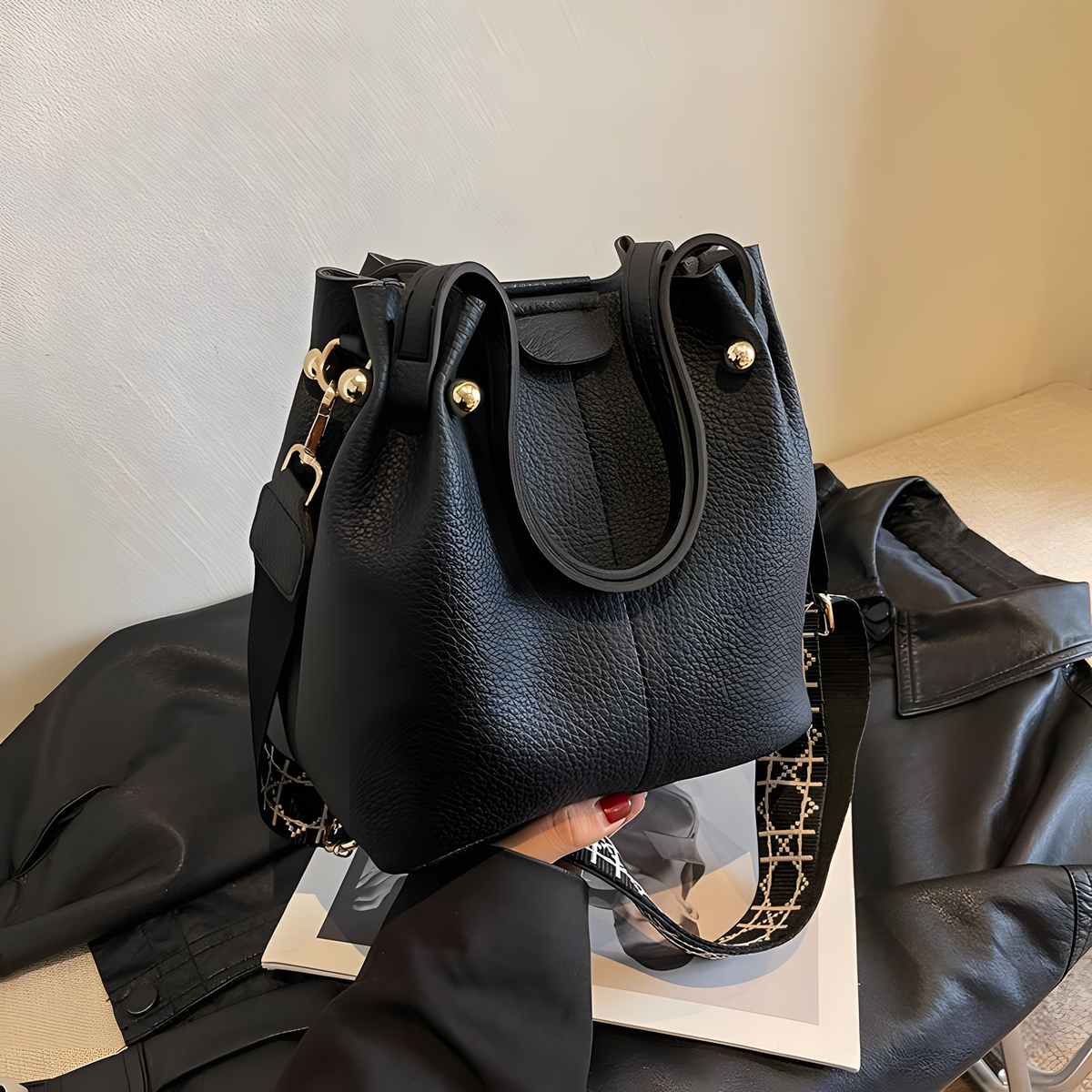 Compact Bucket Handbag with Wide Patterned Shoulder Strap