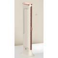 A modern tower fan in a warm off-white color with metallic rose gold accents on the top, side vent, and base, shown against a neutral beige background.