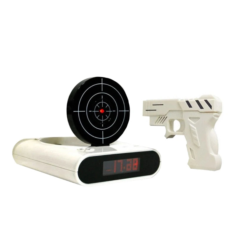 Digital clock with target and toy gun on a white background