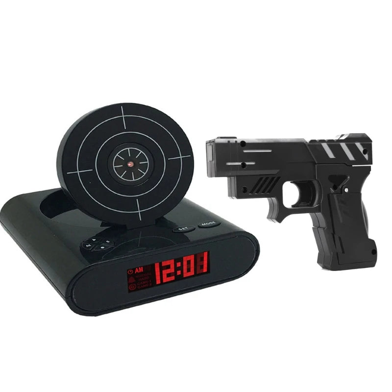 Black alarm clock with target design and black gun-shaped remote control on a white background