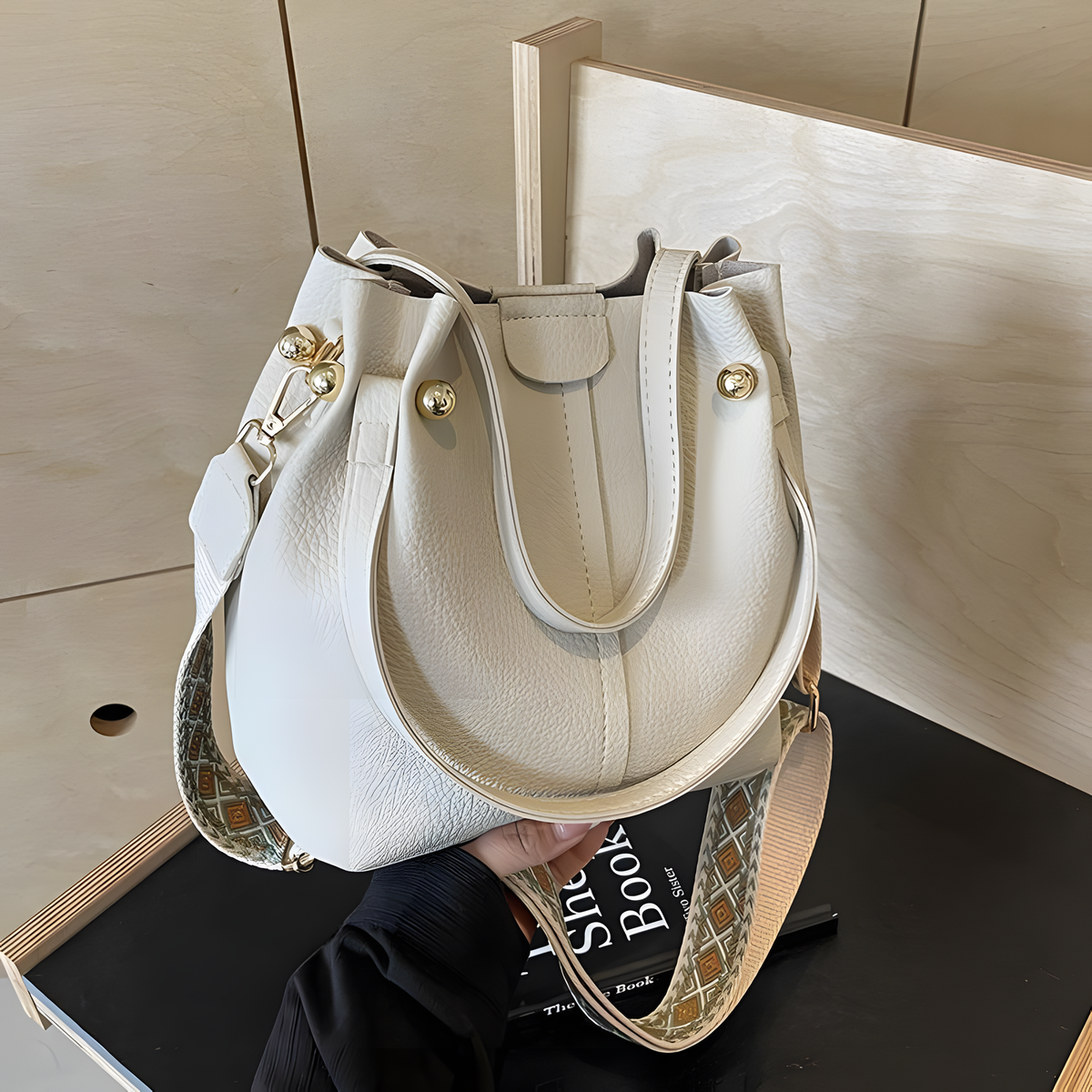 Compact Bucket Handbag with Wide Patterned Shoulder Strap