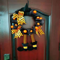 Halloween Witch Leg Wreath with Striped Legs and Curled Shoes