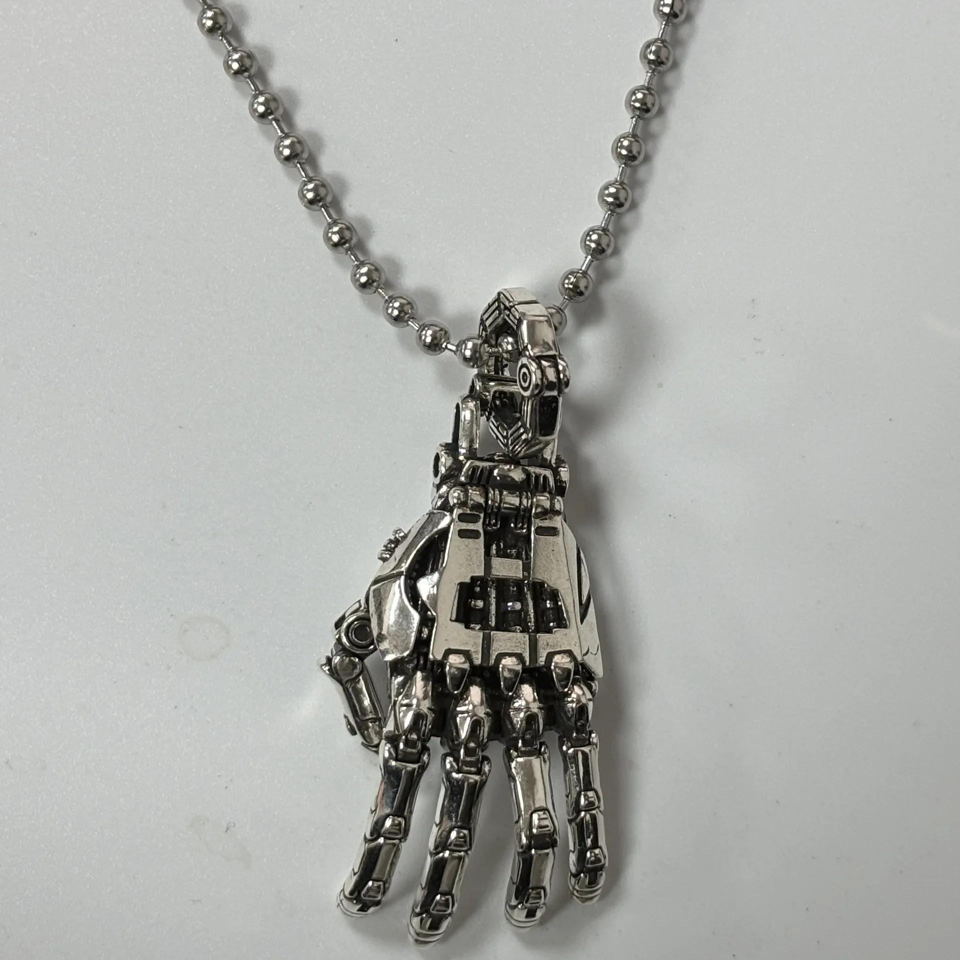 Retro Mechanical Hand Pendant Necklace for Themed Styling