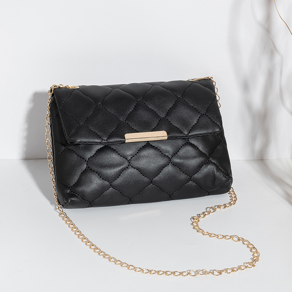 Quilted Chain-Strap Crossbody Bag with Flap Closure