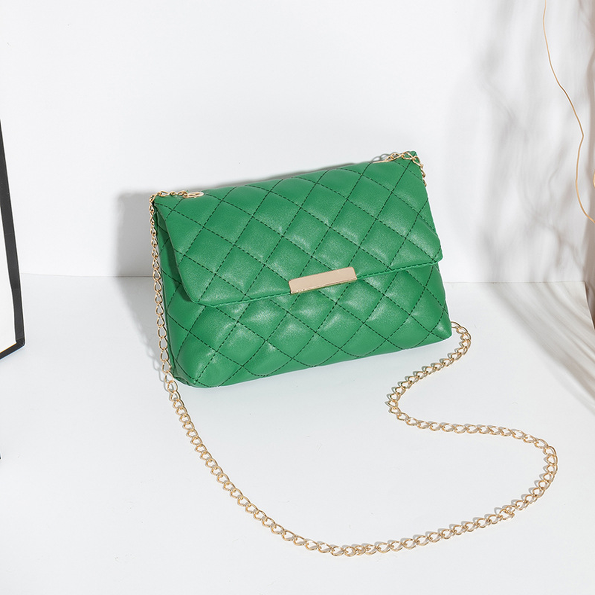 Quilted Chain-Strap Crossbody Bag with Flap Closure