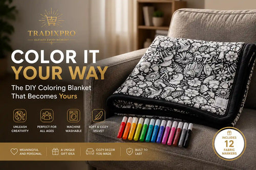 A promotional product image for a DIY coloring blanket set by Tradixpro. A folded black and white floral patterned blanket is draped over a gray armchair, with a row of 12 colored fabric markers placed in front.