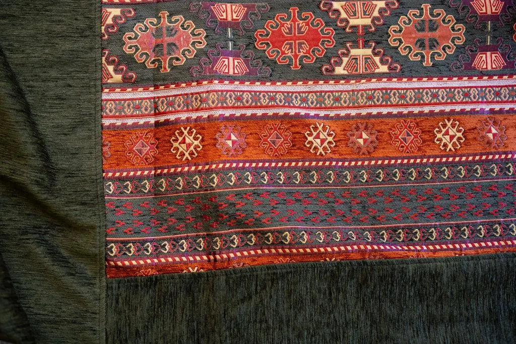 Olive Turkish rug shown in a beach styling scene