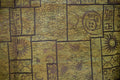 Close-up of olive Turkish rug with framed flowers, leaves, sun shapes and crescent moon motifs